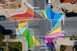 Areal shot of colorful street crossing square