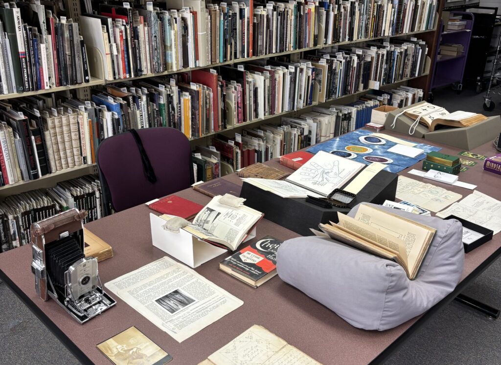 Library with desk and various objects